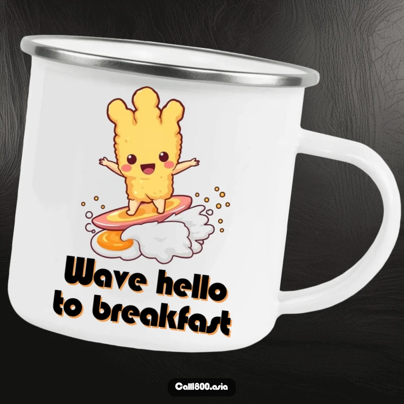 Funny tempura character surfing a dipping sauce wave, printed on a durable enamel camping mug for outdoor fun.