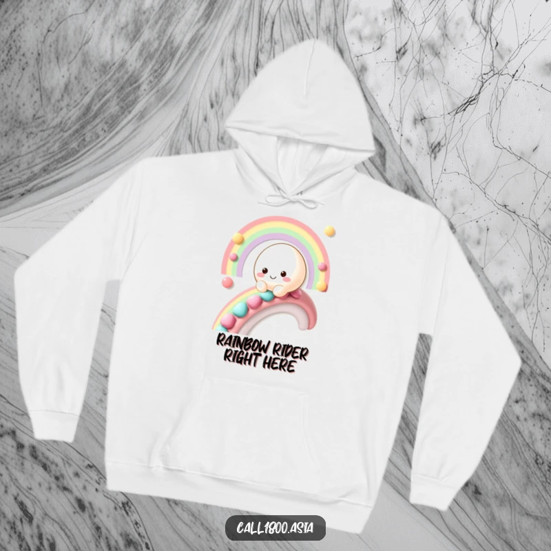 Funny mochi character sliding down a candy rainbow, featured on a soft and warm hoodie.