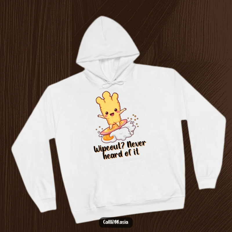 Funny tempura character catching a wave on dipping sauce, depicted on a warm and cozy hoodie for ultimate comfort.