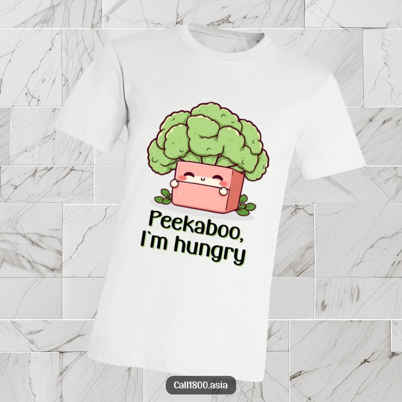 Funny bento box character playfully peeking from behind a giant broccoli floret on a comfortable and stylish t-shirt.